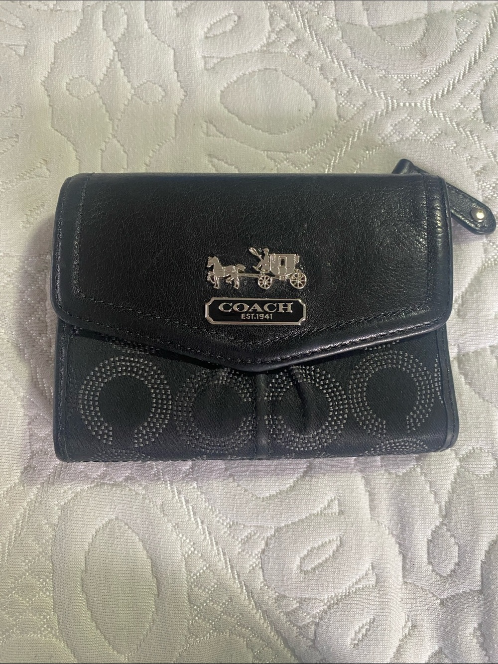 COACH Black Signature Coach Horse & Carriage wallet.